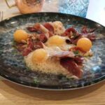 Festival de Arroces 2025 de Grupo Castellano: un homenaje al sabor y la técnica del chef Juantxo Sánchez 3 Entrada Melón con Jamón Ibérico