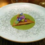 Tetela especial en mole verde