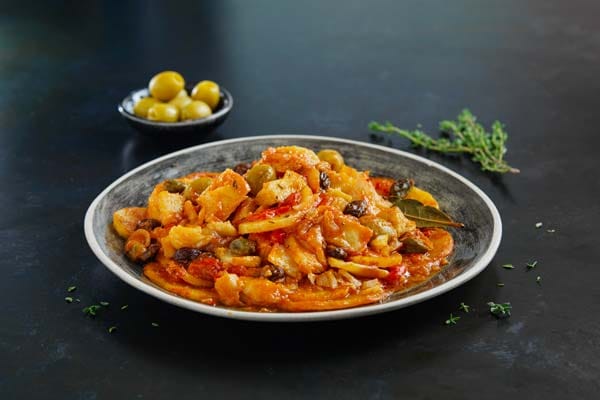 De la solemnidad a la alegría navideña: La historia del bacalao a la vizcaína