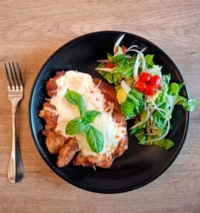 milanesa napolitana en Travertino