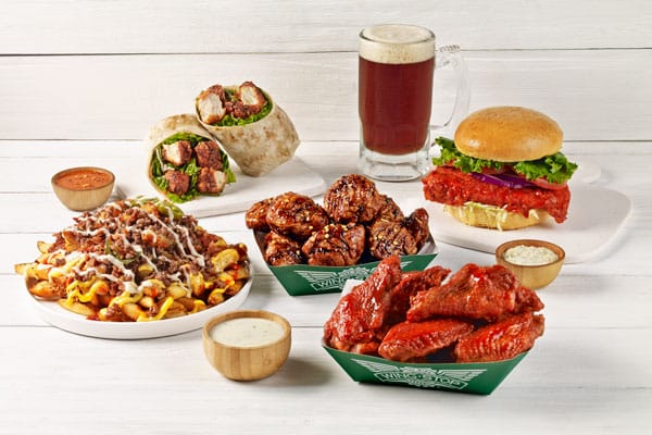 Tu próxima visita a Wingstop te podría llevar directito a Nueva York: conoce esta increíble dinámica